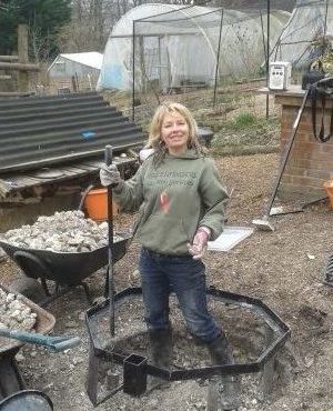 daisy helping build firepit 2012